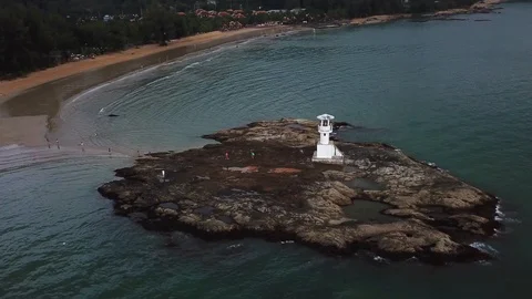 Small lighthouse on a beach north of Phuket, Thailand Stock Footage 88129058