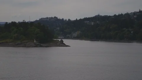 Small Lighthouse On A Green Island Stock-Footage 118099535