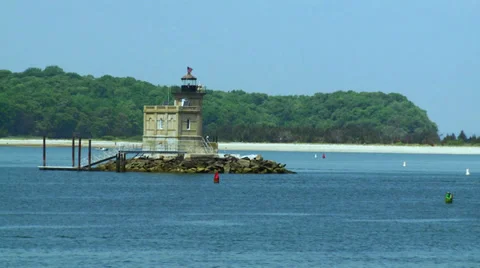 Small lighthouse in the middle of a harbor (2 of 2) Stock Footage 32302391