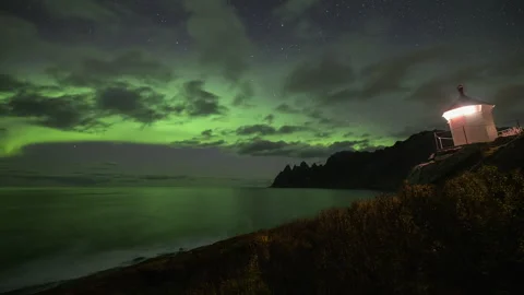 Small lighthouse with Northern Lights Stock Footage 250296293
