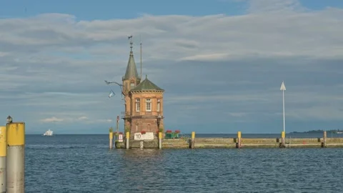 Small Lighthouse on old pier in harbor of Constance - Germany.  스톡 동영상 317980660