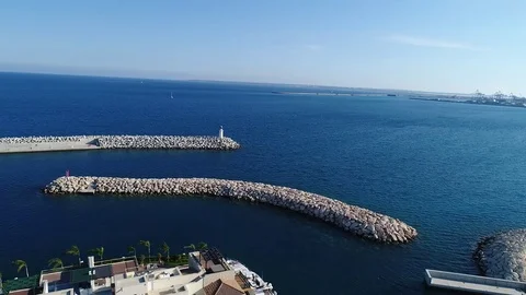 Small lighthouse on rock path Stock Footage 78356216