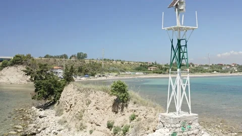 Small lighthouse on the rock in the sea. Stock Footage 132610291