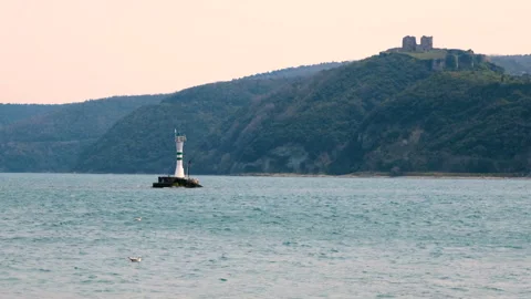 Small lighthouse on the sea, tranquil scene slow motion Stock-Footage 131090002