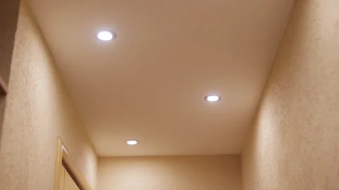 Small lights in the ceiling that illuminates the corridor. Video stock 256439721