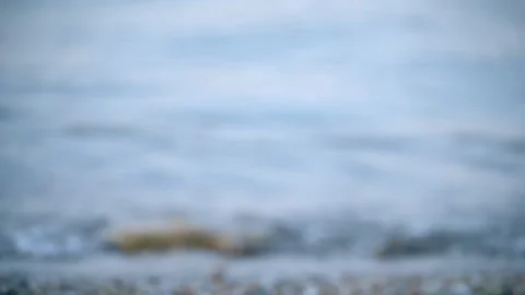 Small little waves roll over sandy seashore of ocean close-up Stock Footage 150277569