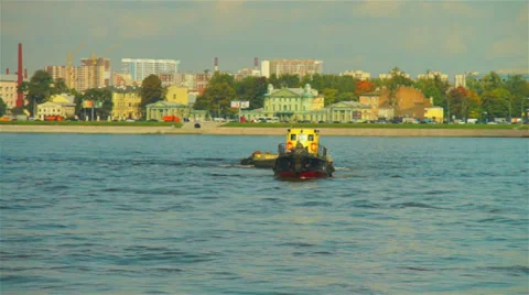 Small load ship with boat on hook passing through Neva river Stock Footage 36727261