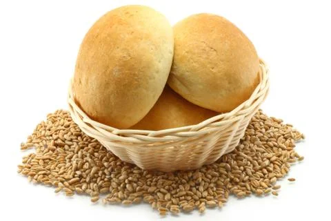 Small loafs in wicker plate Stock Photos