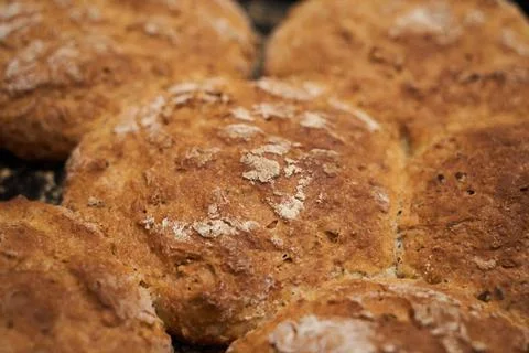 Small loaves of bread with seeds. Selective focus Stock Photos