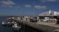Small local fishing port harbor docks and seascape with boats Portugal Algarve 4k or 4k+ Resolution