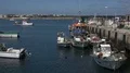 Small local fishing port harbor docks and seascape with boats Portugal Algarve 4k or 4k+ Resolution