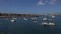 Small local fishing port harbor seascape panning with boats at Portugal Algarve 4k or 4k+ Resolution