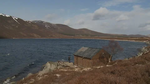 Small lodge at Loch Muick (6) zoom out Stock Footage
