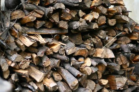 Small logs stacked on top of each other Stock Photos