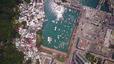 Small man-made bay near old fishing village, aerial top-down view Stock Footage 76797682