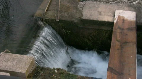 Small Man-made Waterfall Stock Footage 834414