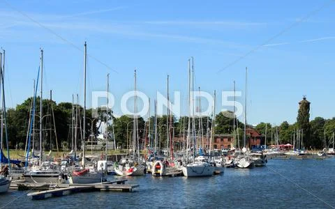 Small marina yacht port ~ Premium Stock Photo #26389324