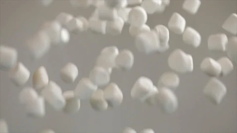 Small Marshmallows Thrown up in the Air Stock Footage 99163898