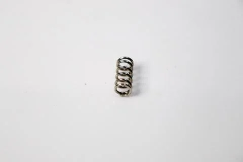 Small Metal Compression Spring Close-Up Stock Photos