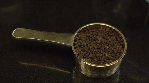 A small metal container with black pepper Stock Footage 108287169