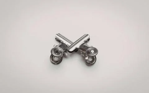 Small metal hinges on a white background Stock Photos