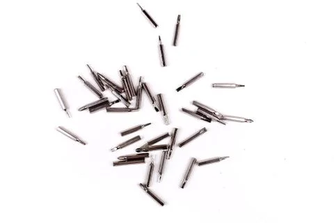 Small metal interchangeable screwdriver bits for a multitool Stock Photos