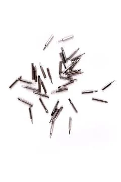 Small metal interchangeable screwdriver bits for a multitool Foto stock