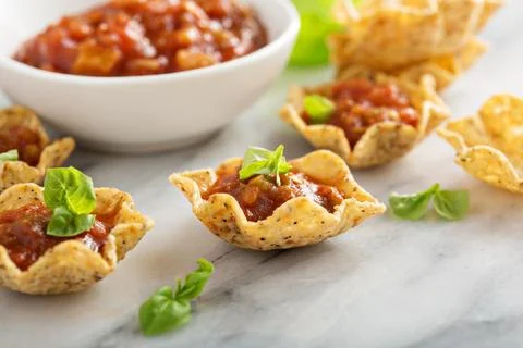 Small mexican style appetizers made with tortilla bowls Stock Photos