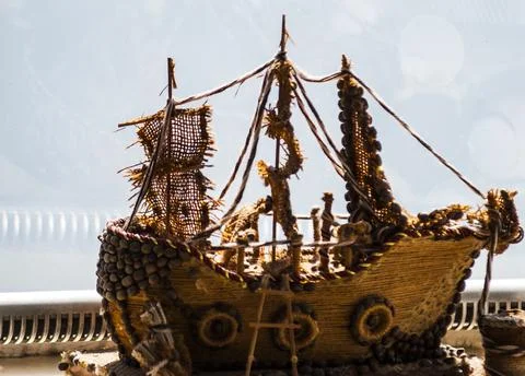 A small model of the ship on the background of the river 写真素材