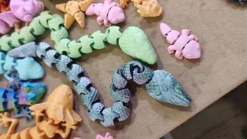 Small models snake and newts printed 3D printer molten plastic Stock Footage 304104869