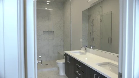 Small Modern Bathroom Lowering to Floor. shot lowers on a new modern bathroom Stock Footage 100995656