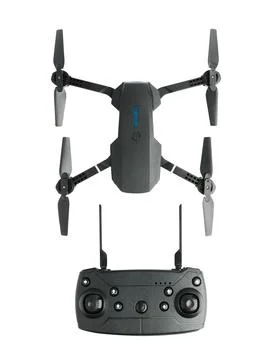 Small modern quad-engine drone with radio controlled remote control insulated Stock Photos