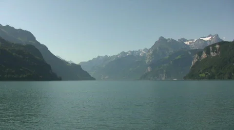 Small moored boat on Lake Luzern Switzerland Stock Footage