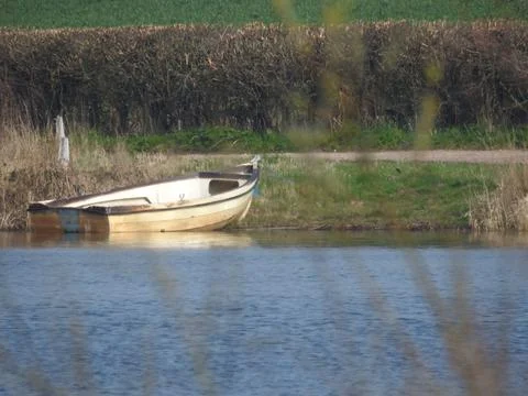 Small moored boat Stock Photos