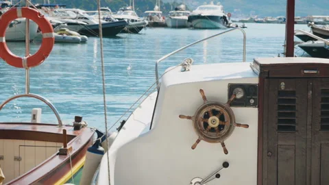 Small motor boat moored at the dock Stock Footage 85863897