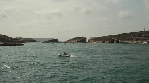 Small motor boat passing 스톡 동영상 46325406
