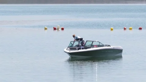 Small motor boat in river Stock Footage 77889044