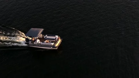 Small motor tray quickly floats along the river Stock Footage 160989796