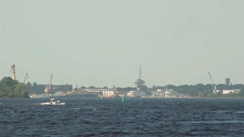 Small Motorboat Driving Up The River In Wind HD Stock Footage 76400665