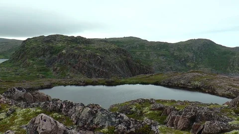 Small mountain lake on a granite top. Stock Footage 74481982