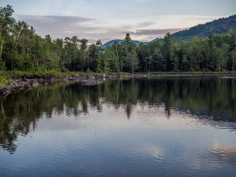 Small mountain lake Stock Photos