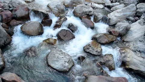 Small mountain river finding its way between the rocks Stockbeeldmateriaal 79443780