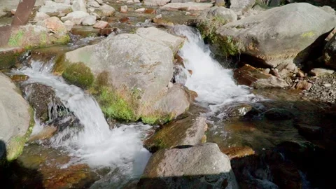A small mountain river in a mountainous area. autumn himalayas Video stock 168934182