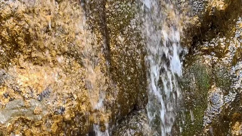 Small mountain river with a small waterfall Stock-Footage 106029648