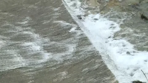 Small Mountain River with Water used for Irrigation Stock Footage 247391653