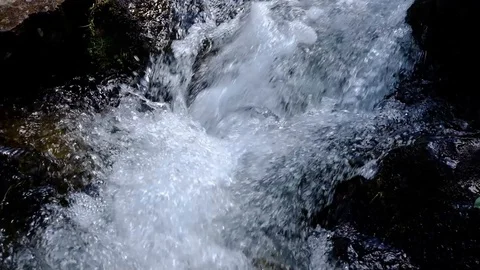 Small mountain stream close up slow motion video Video stock 92077497