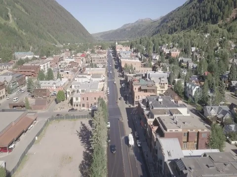Small Mountain Town Flyover Tilt Up Stock Footage 77258568