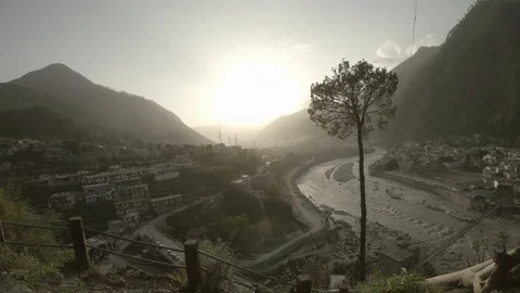 Small mountain town river Ganges flows smoke high pine sunset timelapse Stock Footage 99516684