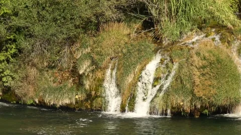 Small mountain waterfall on a hot July day. Stock Footage 141913542