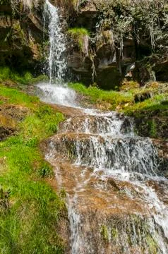 Small mountain waterfall Stock Photos